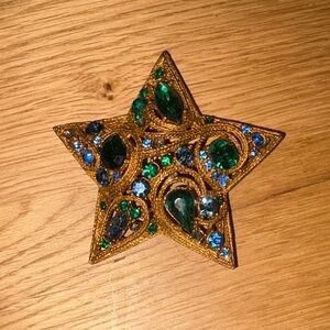La Roco domed paisley rhinestone star brooch pin with green & blue crystals